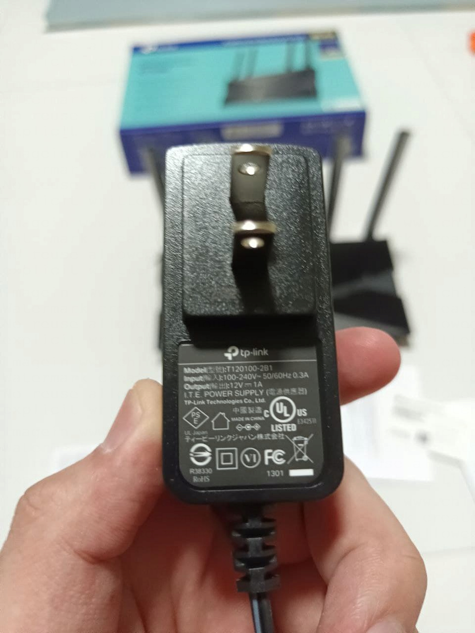 /review-tplink-ax23/ax23_adapter.jpg